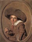Frans Hals Wall Art - A Young Man in a Large Hat
